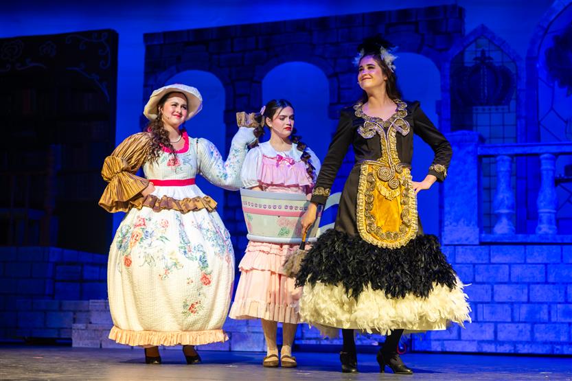 Actors perform onstage